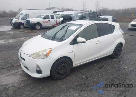 2014 Toyota Prius C One из США, поврежденный, VIN JTDKDTB38E1567788